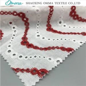 Katoenen borduurstof met oogjes